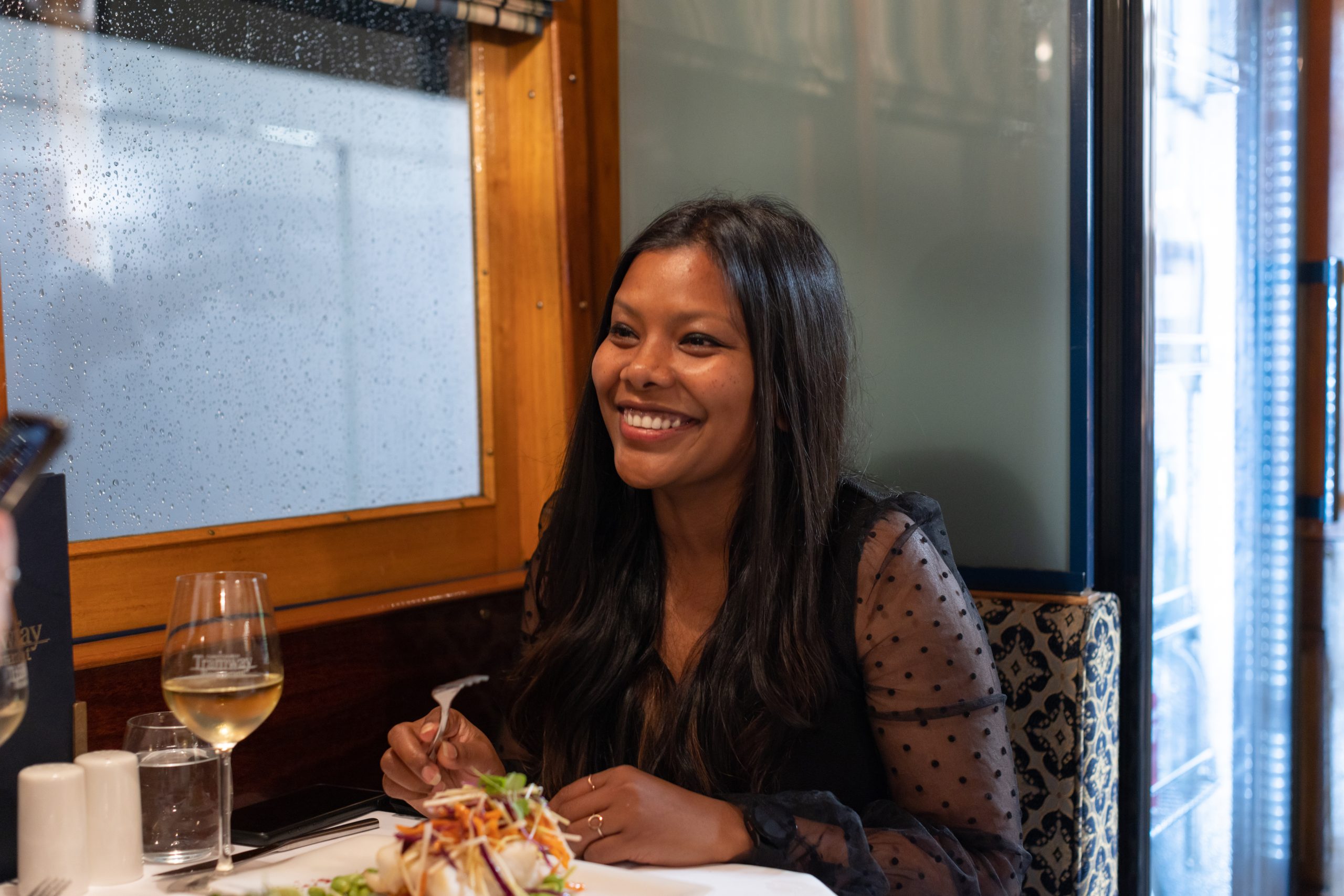 Woman dining on the Christchurch Tramway Restaurant - Best Restaurants Christchurch